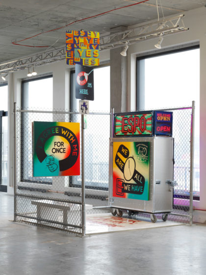 AMP – Beyond The Streets artworks installed in a spacial exhibit. Colorful type and graphic arts